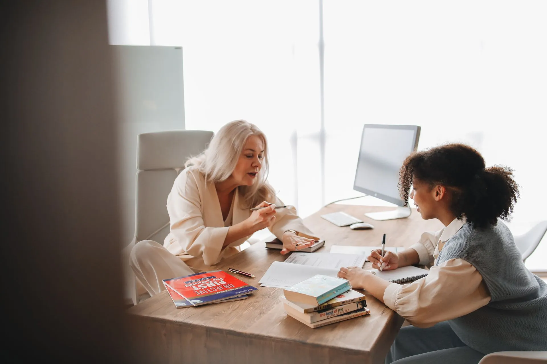 Teachers discussing student progress