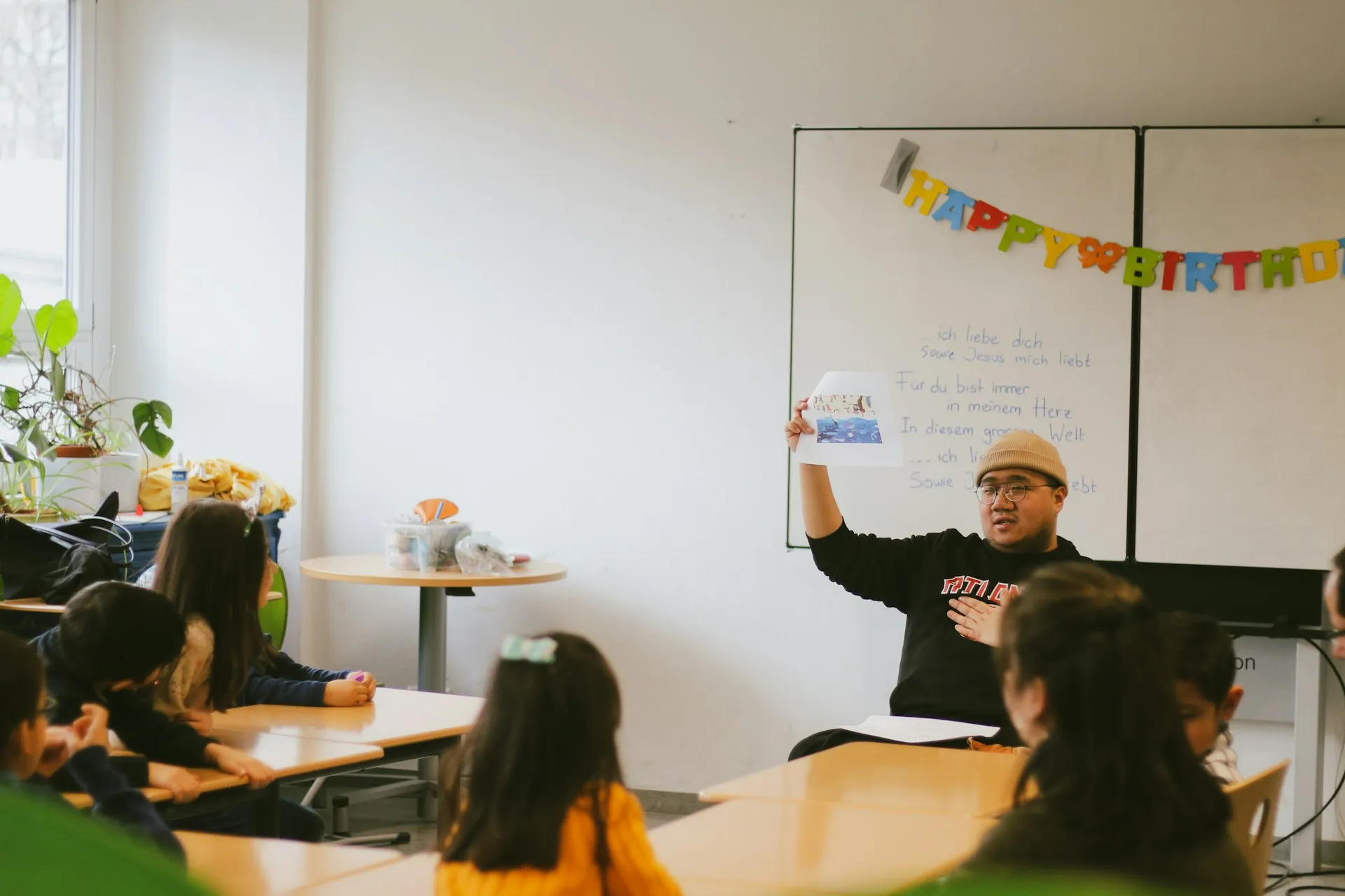 Teacher teaching students in a classroom