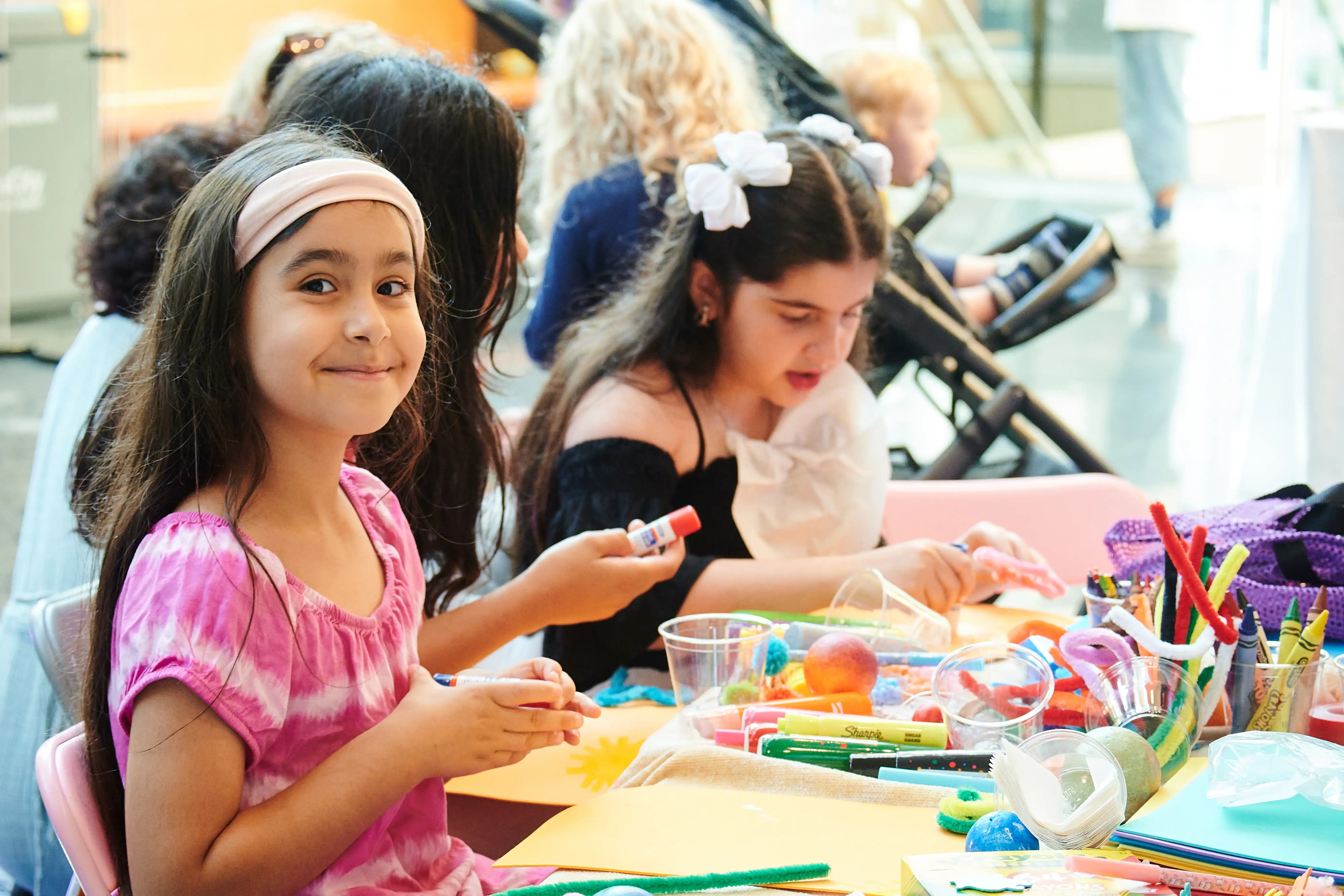 Kids painting at Enya Nova
