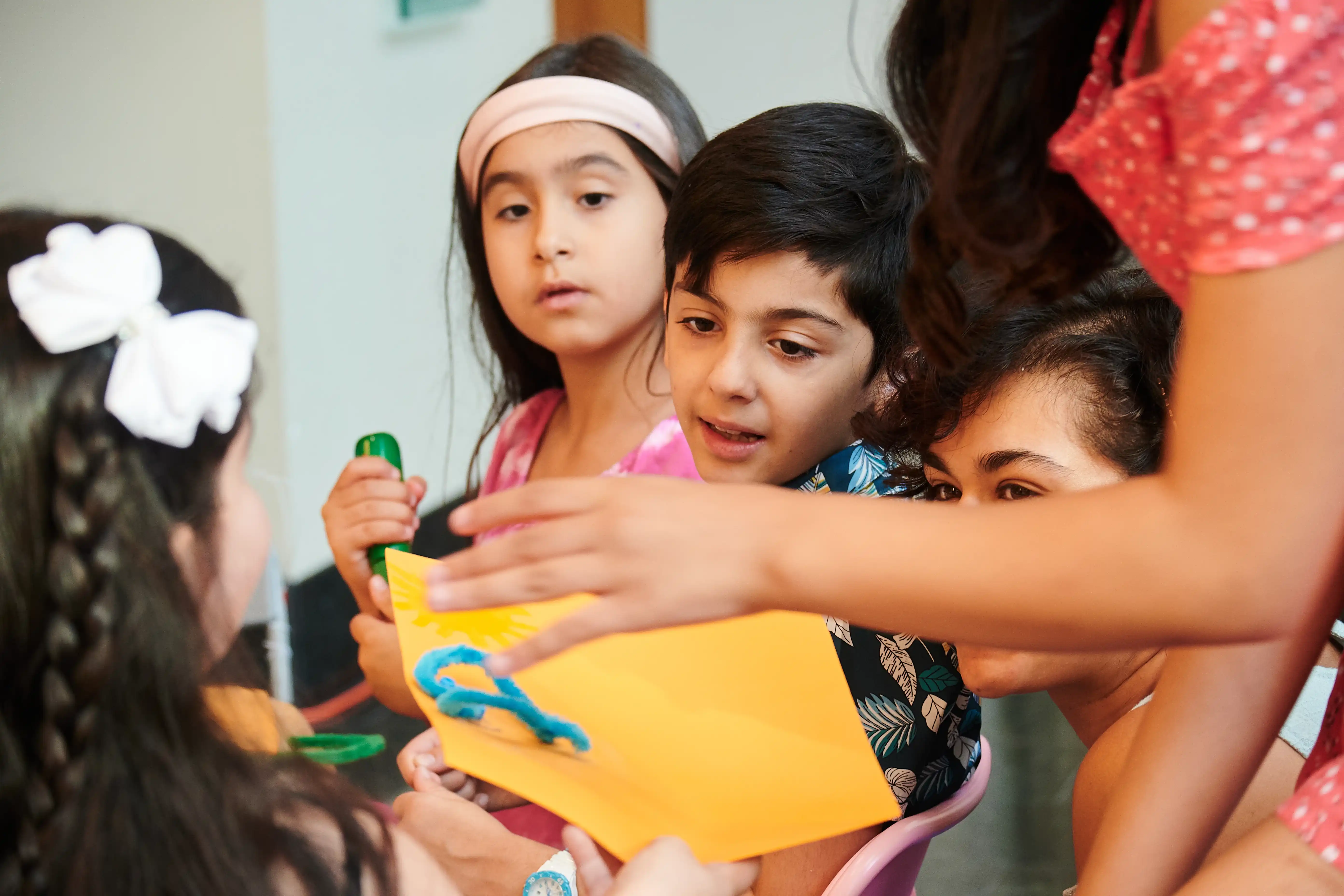 Children engaging in a creative activity